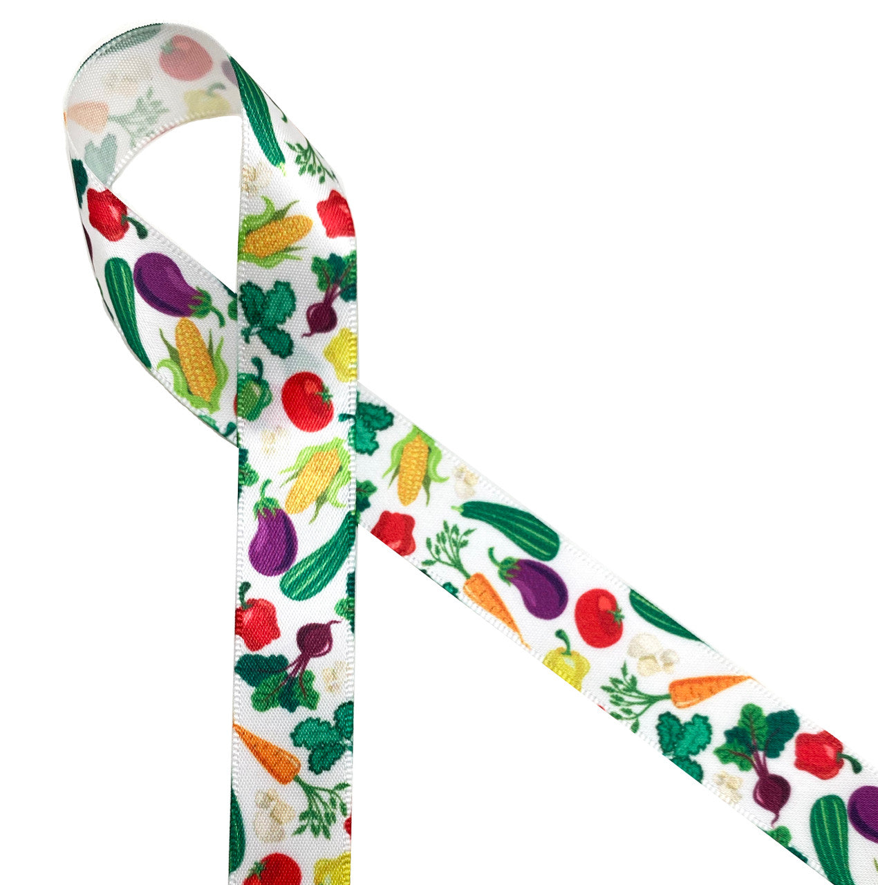 Colorful veggies include tomatoes, eggplant, carrots, corn and peppers printed on 5/8" white single face satin ribbon is a fun ribbon for your  favorite grocer, chef and food delivery person. All our ribbon is designed and printed in the USA