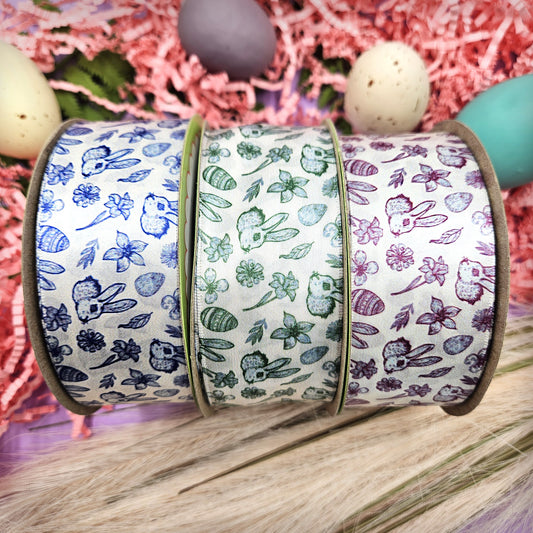 Easter Toile ribbon with bunnies, flowers, eggs and leaves in three colors raspberry, green and blue printed on 1.5" satin