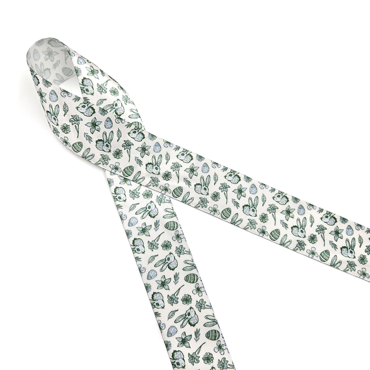 Easter Toile ribbon with bunnies, flowers, eggs and leaves in three colors raspberry, green and blue printed on 1.5" satin