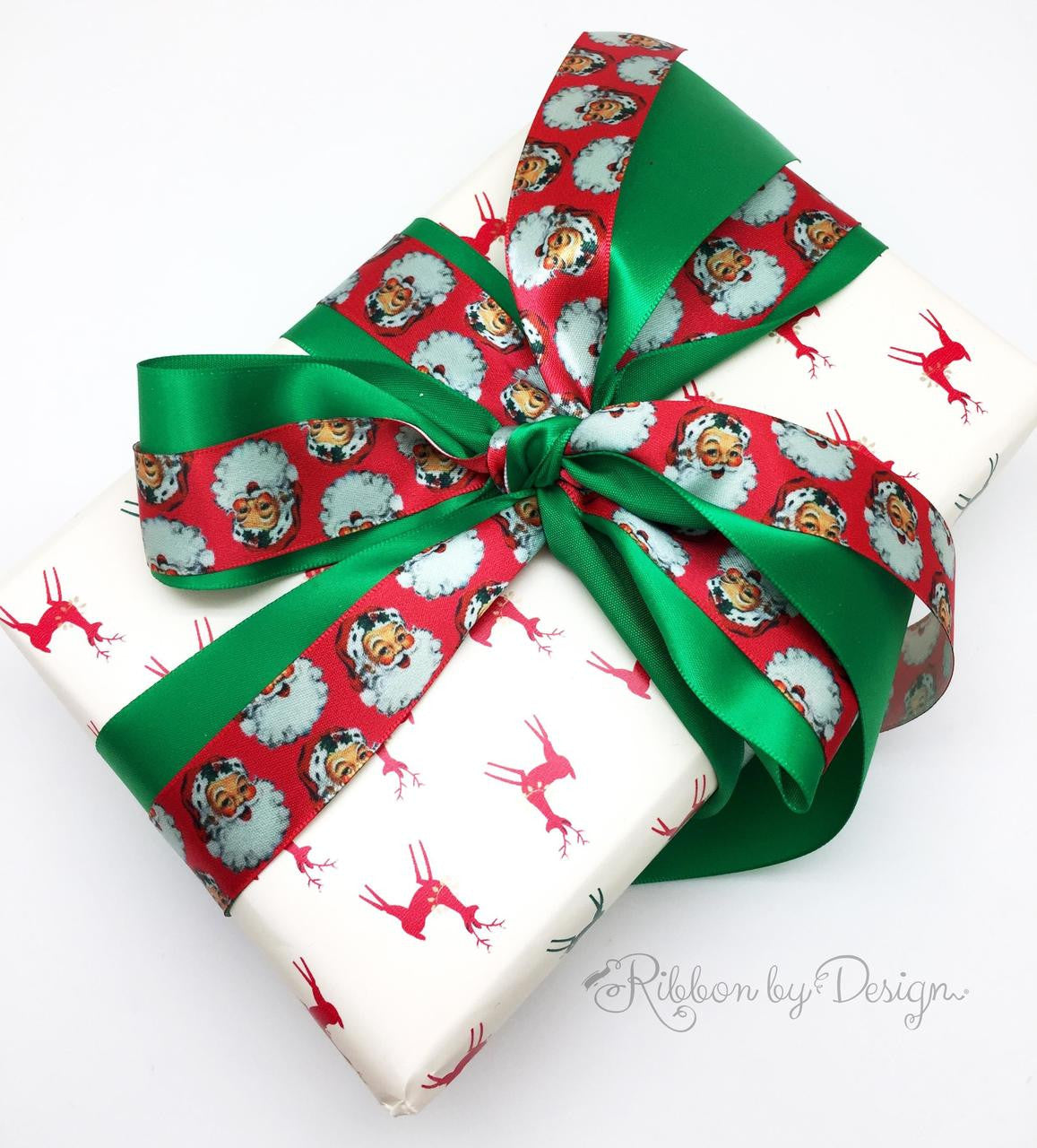 Gift wrapping is so much fun! We love to combine patterns to create truly special packages that will make the recipient smile. Mix and match ribbons and paper for a fun and luxurious gift!
