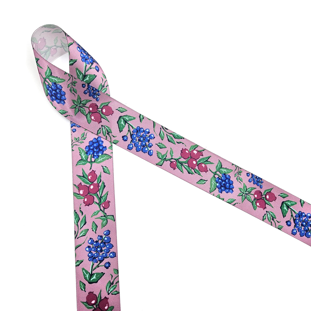 Winter berries ribbon berries in blue, green and deep pink on a mauve background offered in 5/8", 7/8" and 1.5" widths