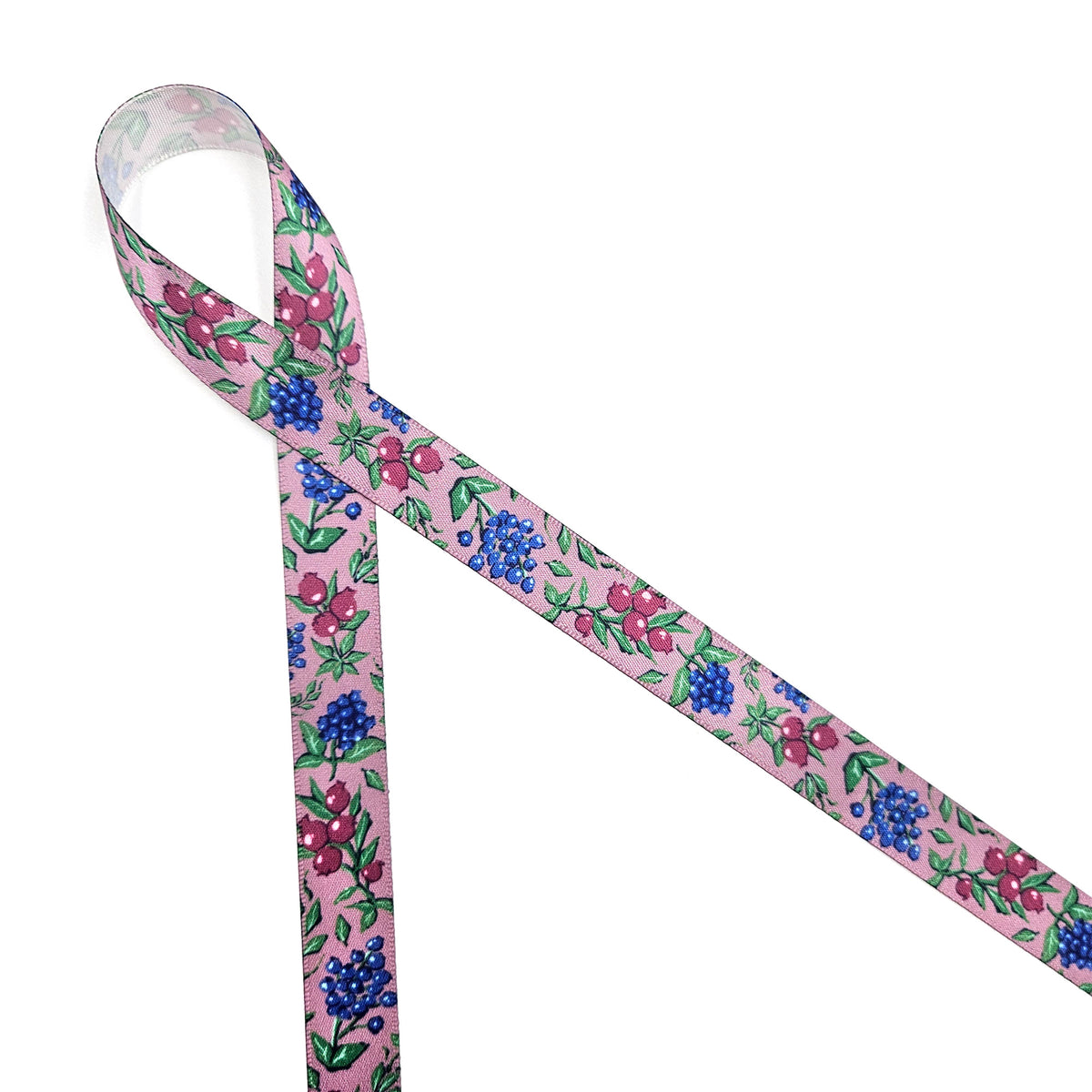 Winter berries ribbon berries in blue, green and deep pink on a mauve background offered in 5/8", 7/8" and 1.5" widths