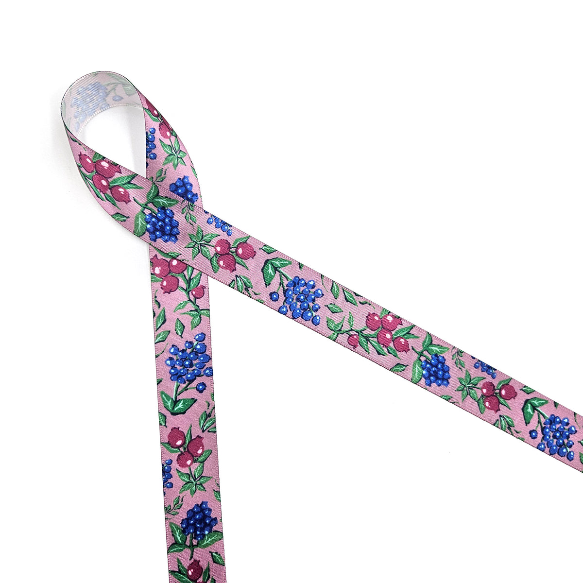 Winter berries ribbon berries in blue, green and deep pink on a mauve background offered in 5/8", 7/8" and 1.5" widths