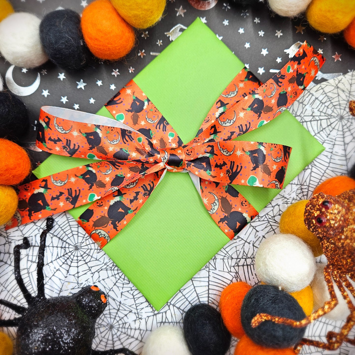 Witches and black cats ribbon on a purple or orange background printed on 7/8" satin