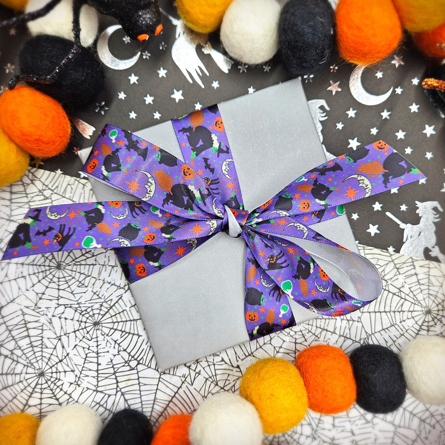 Witches and black cats ribbon on a purple or orange background printed on 7/8" satin
