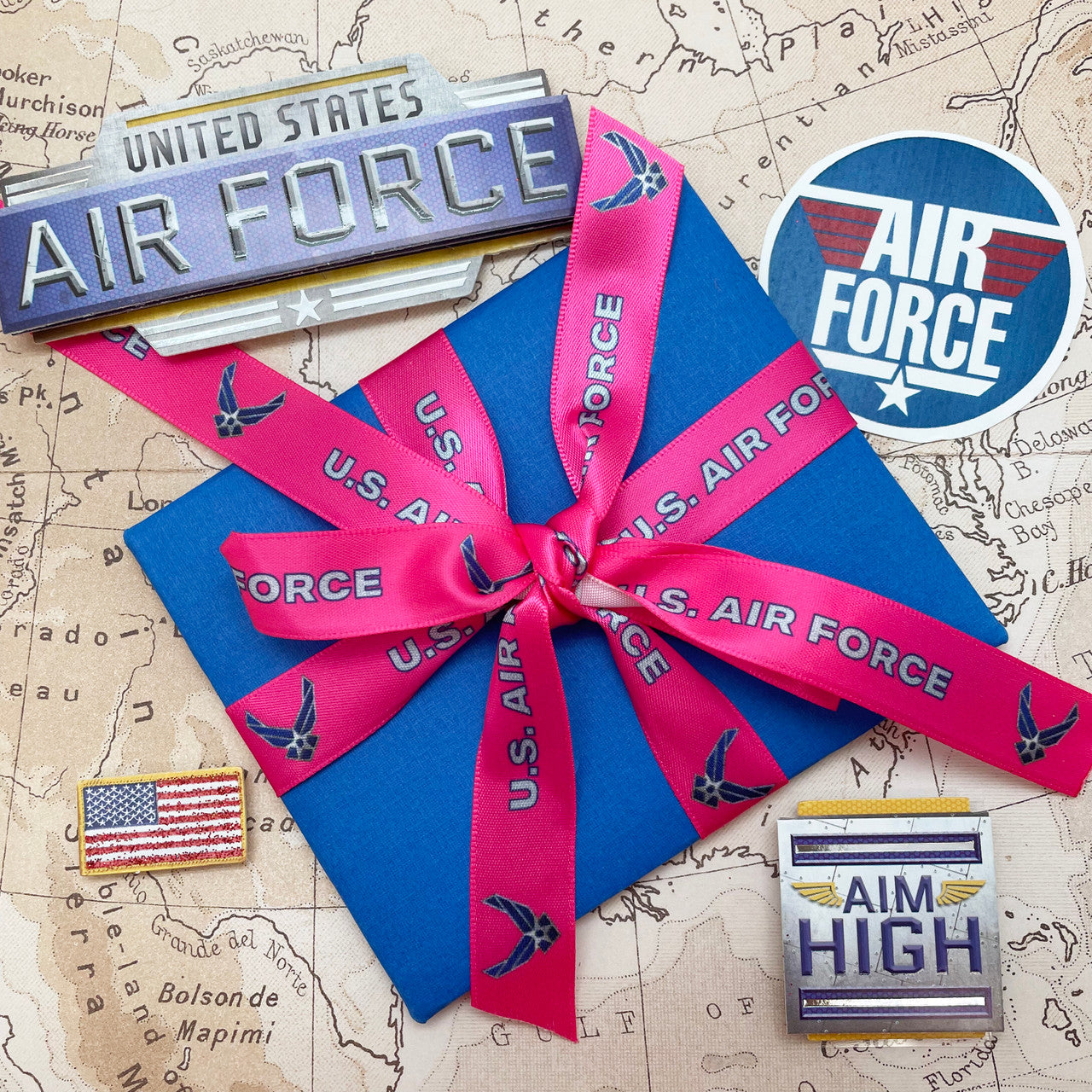 Tie our beautiful pink Air Force ribbon on a pretty blue box for the perfect gift!
