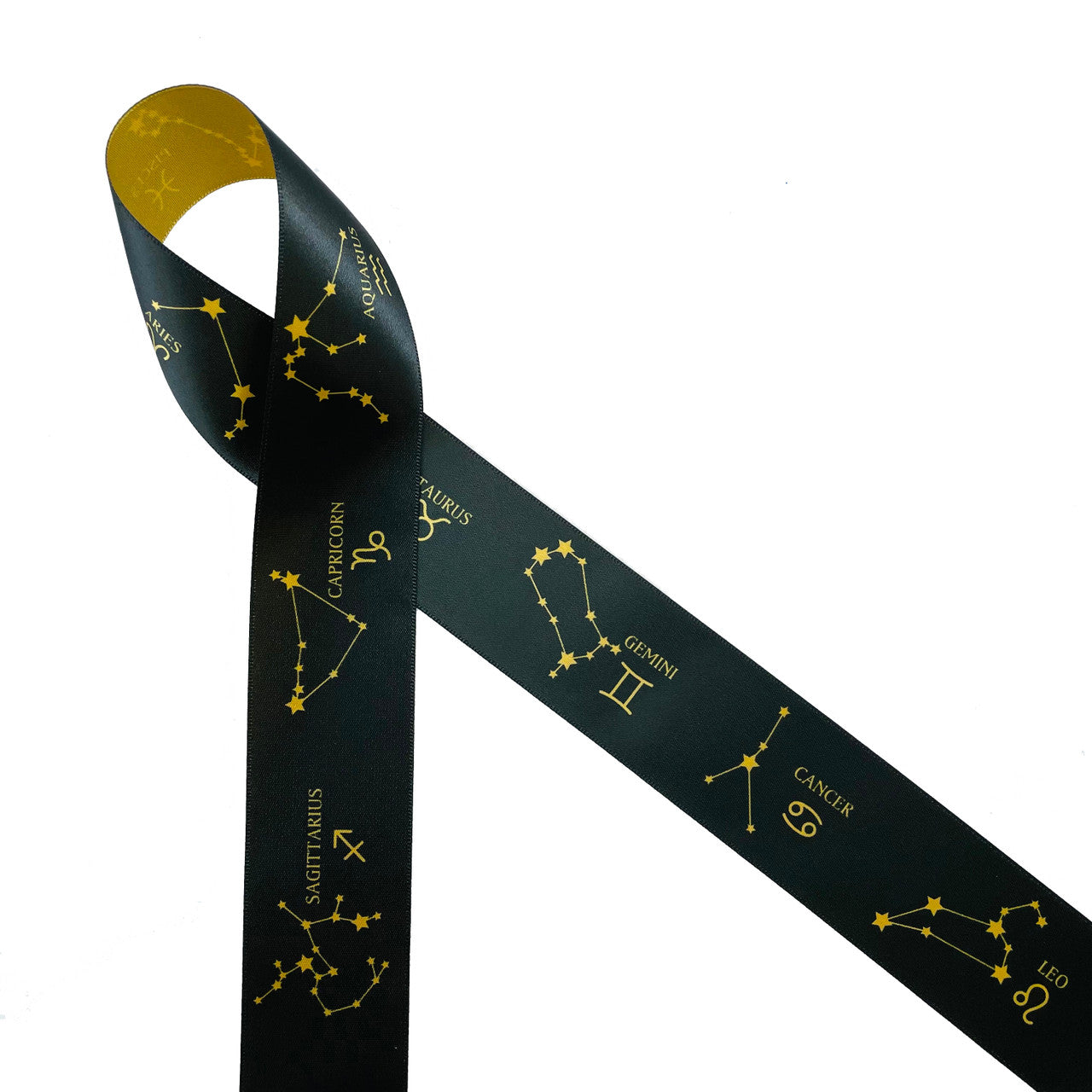 Constellations featuring the twelve zodiac formations on a black background printed on 1.5" dijon gold single face satin ribbon. This bespoke ribbon is ideal for astrology enthusiasts, zodiac themed parties, celestial themed parties, gift wrap, party decor, quilting and crafts. All our ribbon is designed and printed in the USA