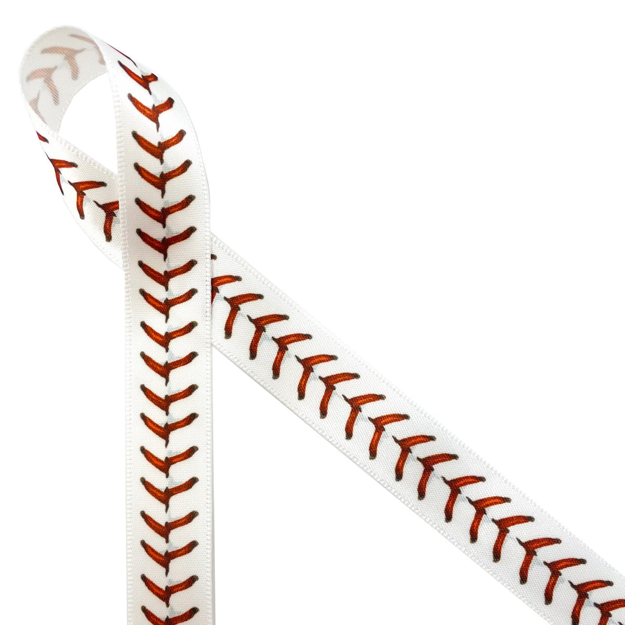 Baseball stitching in red on 5/8" white single face satin ribbon will make any baseball themed gift or favor a sure home run! Be sure to have this ribbon on hand for baseball banquets, gifts, favors, cookies and cake pops for your favorite baseball fan and player! All our ribbon is designed and printed in the USA