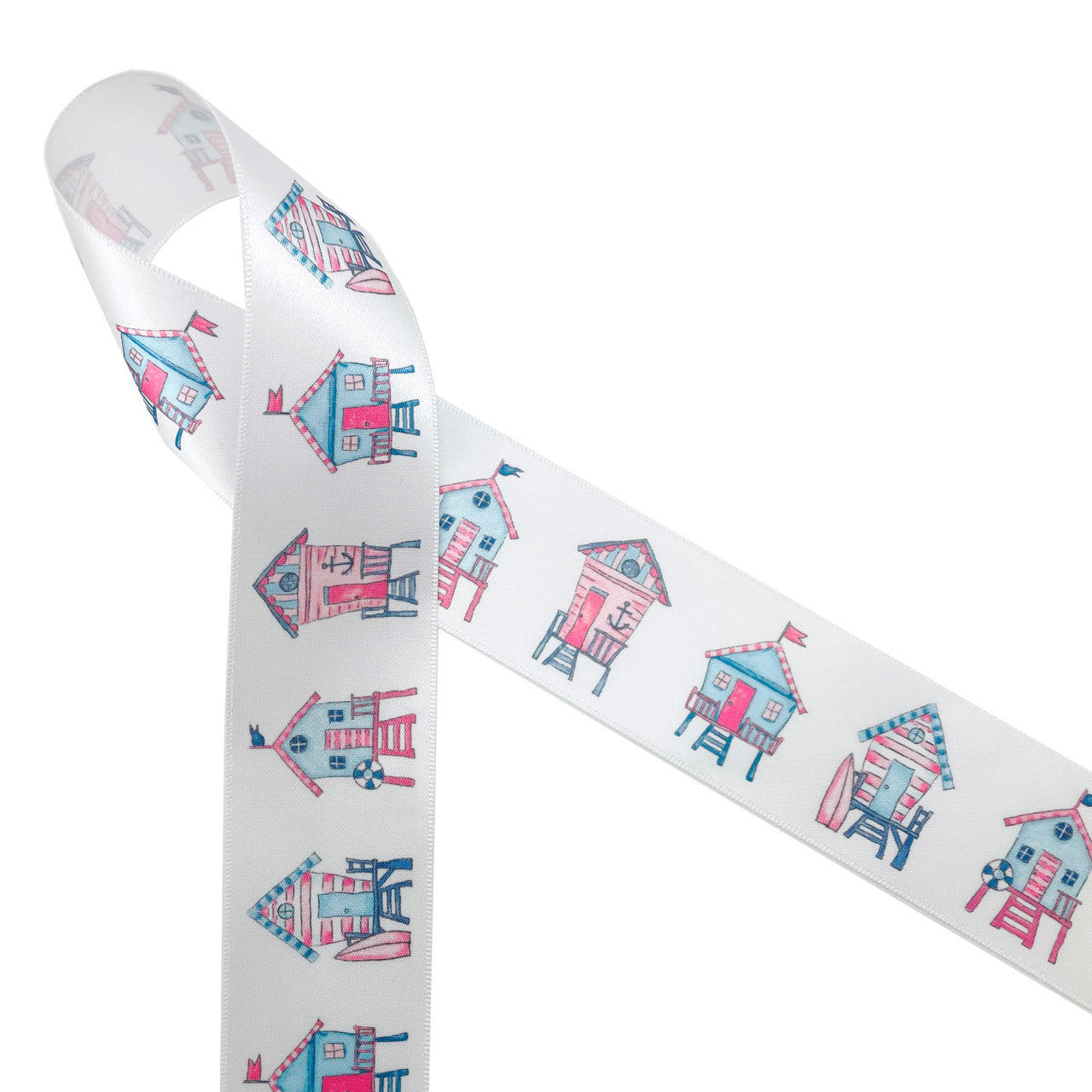 Beach shacks in red white and blue printed on  1.5" white single face satin ribbon is such a fun Summer ribbon! Use this ribbon for gift wrap, gift baskets, party decor, Fourth of July celebrations, crafts, sewing projects and quilting. This is a fun ribbon for beach themed parties all Summer long! All our ribbon is designed and printed in the USA
