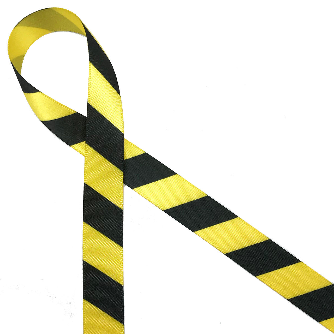 Black and yellow striped caution tape ribbon printed on 5/8" daffodil yellow single face satin ribbon makes for a fun addition to lots of part themes!