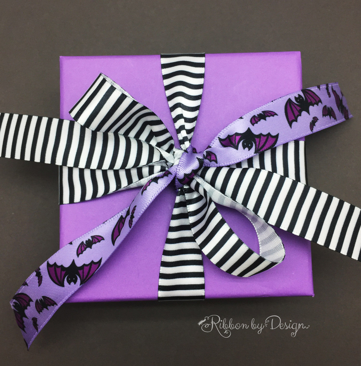 Black and white pinstripe ribbon printed on 5/8