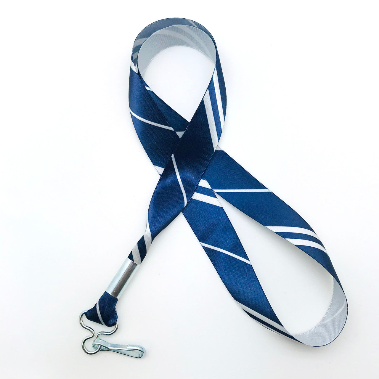 Hogwarts Ravenclaw House ribbon lanyard in blue and silver stripes printed on 7/8" silver single face satin ribbon is a fun gift idea for all the Harry Potter fans on  your gift list. Perfect for events, parties and weddings too! All our products are designed, printed and assembled in the USA