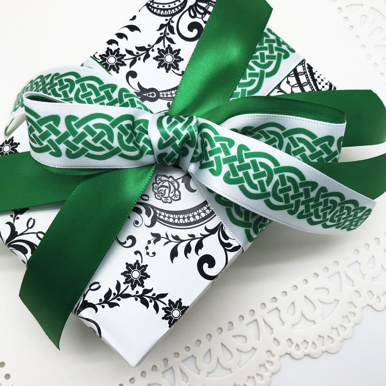We always love mixing patterns! Our Celtic knot mixed with a solid green on a black and white damask paper is oh so pretty!