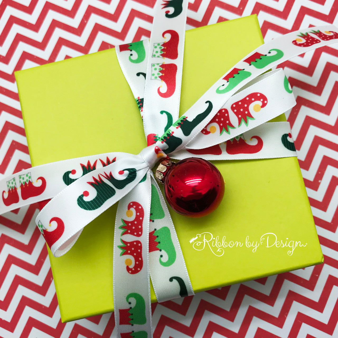 These sweet little elf shoes are just the cutest tying a small box! No wrapping paper needed!
