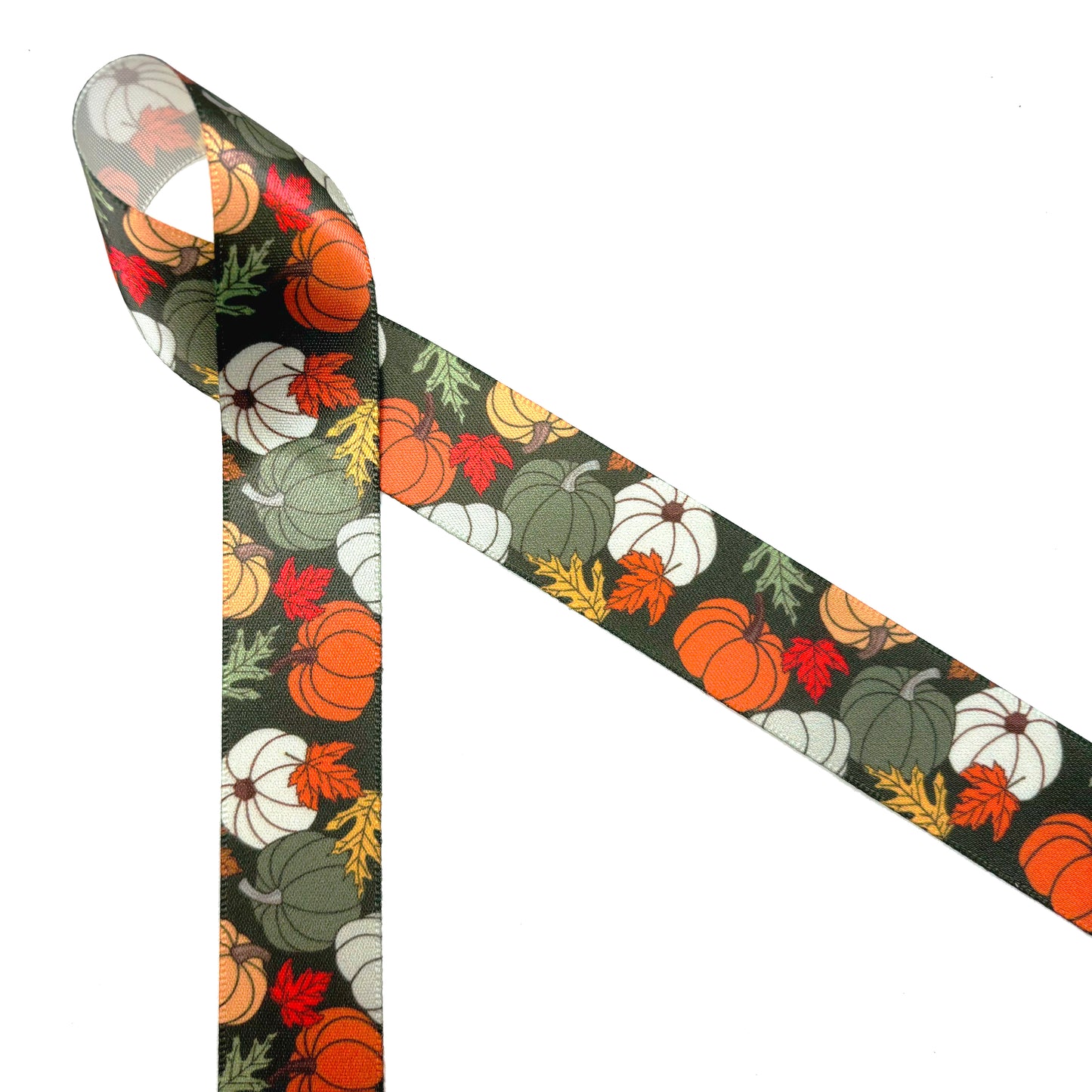 Fall Pumpkin Ribbon artful pumpkins in orange, green, yellow and white with Fall leaves on a dark green background printed on 7/8" and 1.5" white satin