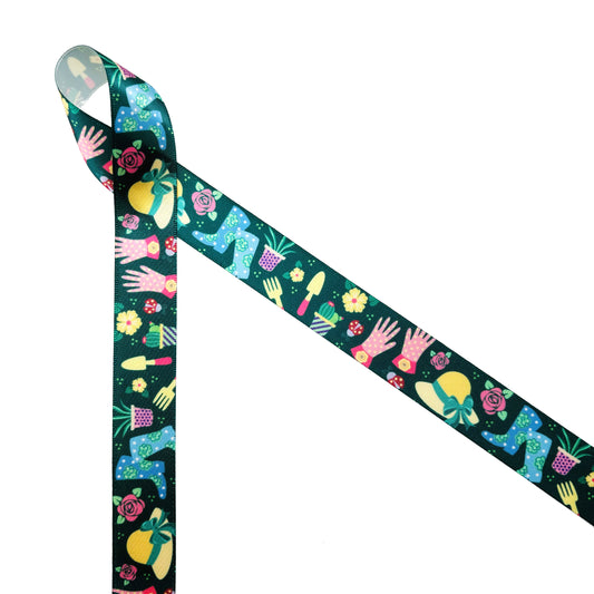 Gardening ribbon featuring plants, flowers, boots, hats, gloves and tools on a dark green background printed on 7/8" white satin