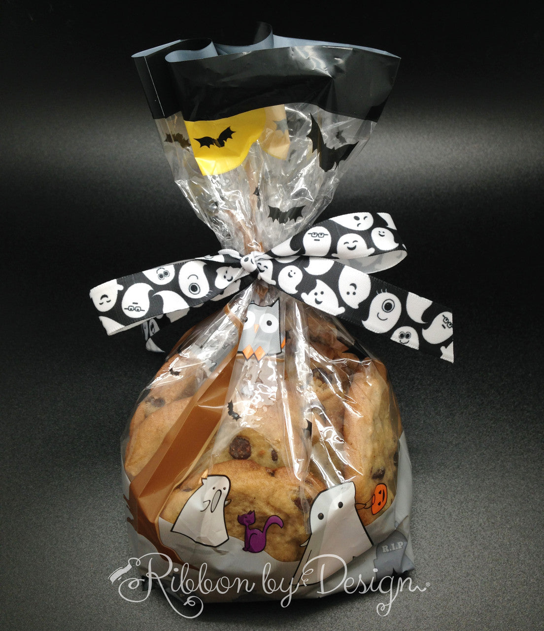 Chocolate chip cookie treats packed in a Halloween cello bag and tied with our ghost ribbon will be a favorite for all trick or treaters!