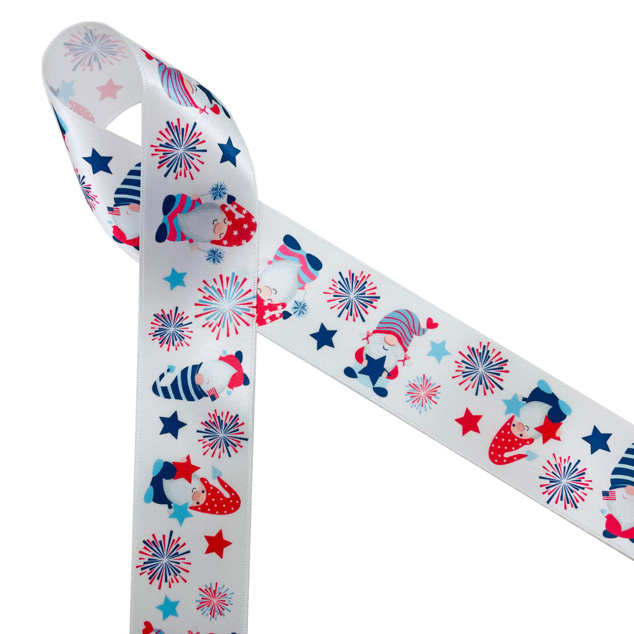 Patriotic gnomes in red, white and blue with stars, stripes and fireworks printed on 1.5" white single face satin ribbon is a 4th of  July must have for party decor, gift wrap, craft projects, hair bows, sewing and quilting projects too! Be sure to be ready for a party, gnomes in tow! All our ribbon is designed and printed in USA!