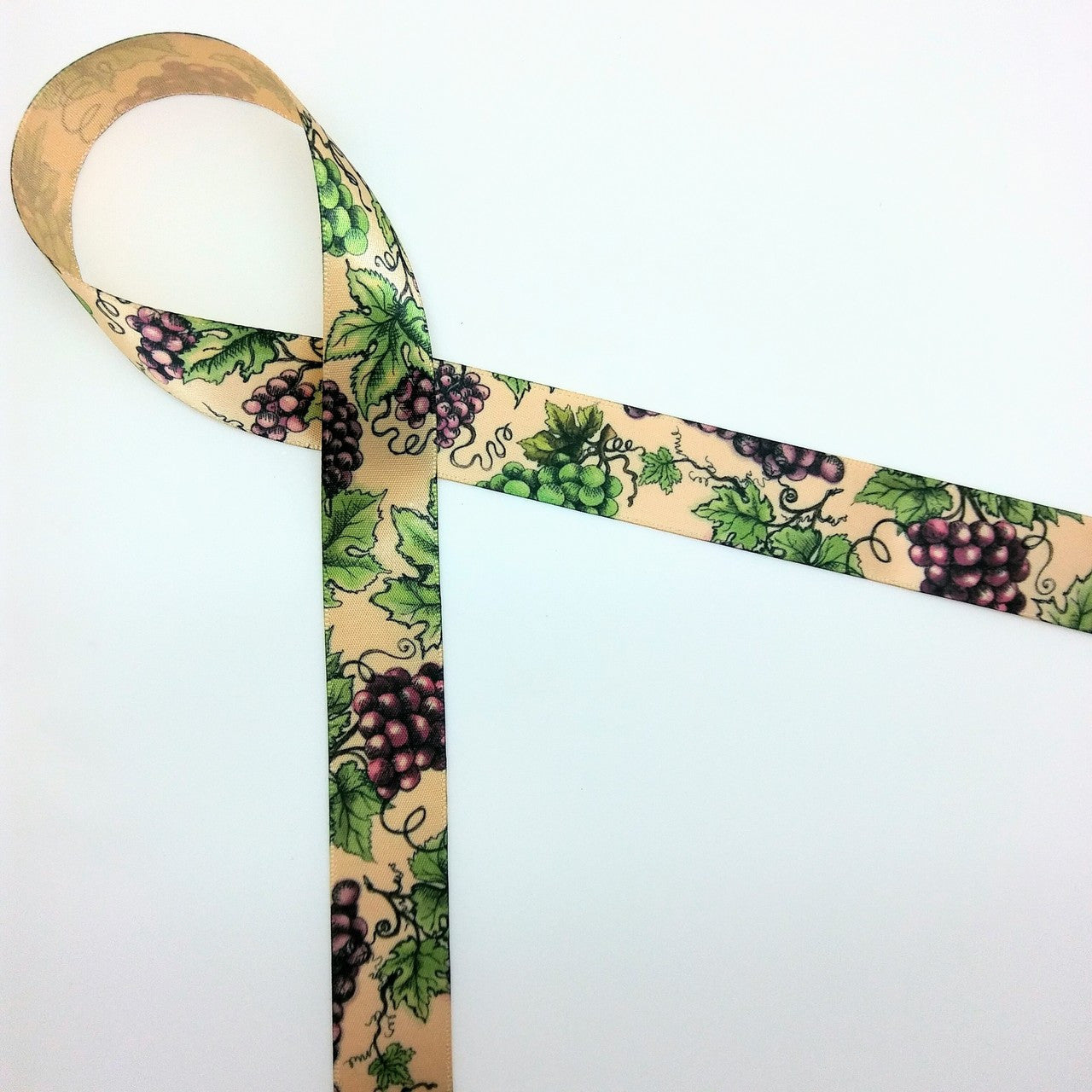 Grapes and grape leaves on the vine on 5/8" raw silk ribbon makes a lovely accent to any grape themed gift!
