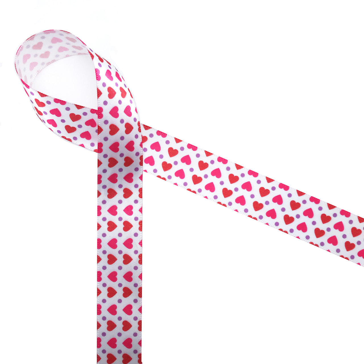 Hearts of hot pink and red mix with little lavender dots to create the sweetest Valentine design! Printed on 7/8" white single face satin, this ribbon will make your Valentine feel extra special!