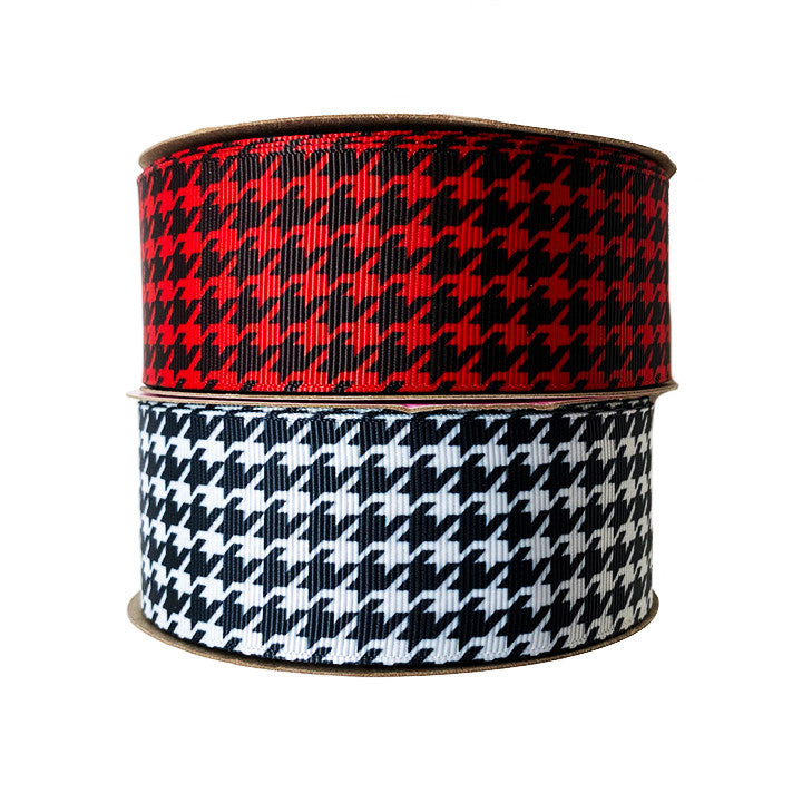 Our houndstooth pattern in 1.5" grosgrain comes in red or white for the best classic hair bows around!