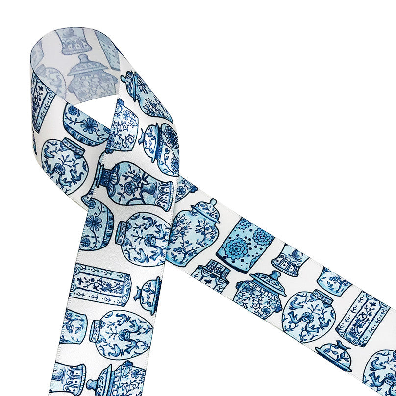 Beautiful blue and white ginger jars in a variety of shapes and designs printed on 1.5" white single face satin is the ideal ribbon for gorgeous gift wrap for that special person of elegance and grace. This is perfect for sewing, crafting and interior decor too! All our ribbon is designed and printed in the USA