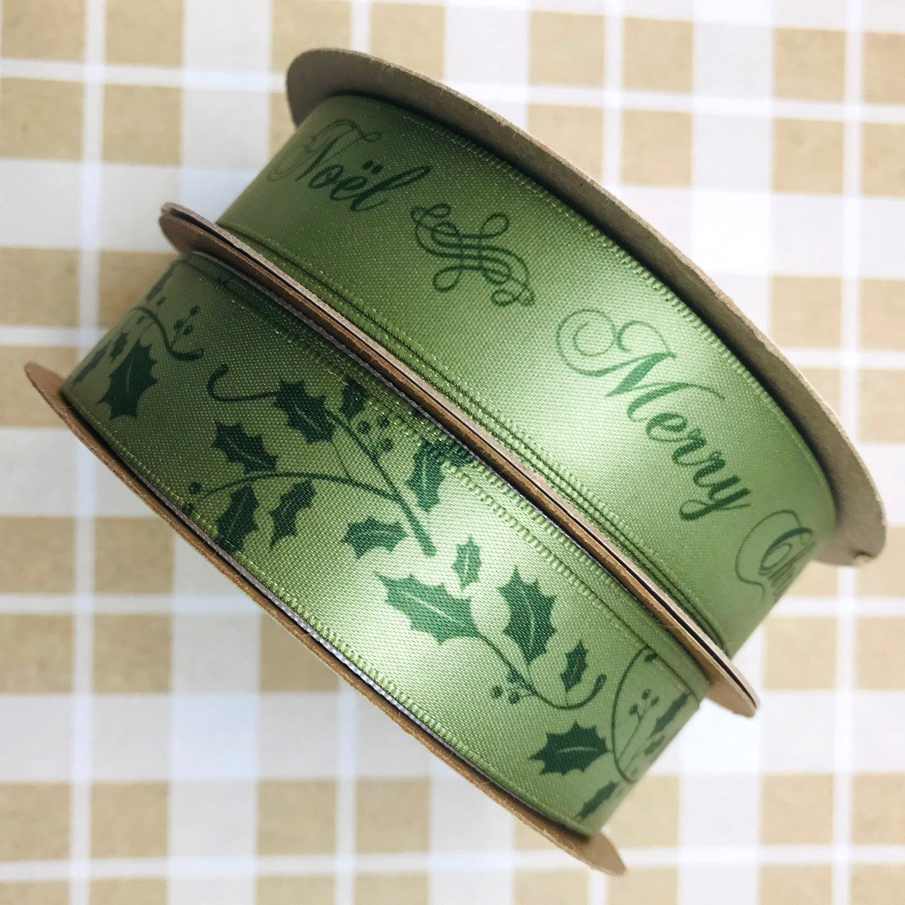 Our Joyex Noel and Merry Christmas pairs so beautifully with our tone on tone holly ribbon in sage. Pair these two ribbons on gifts, trees, table scapes, floral designs and wreathes!