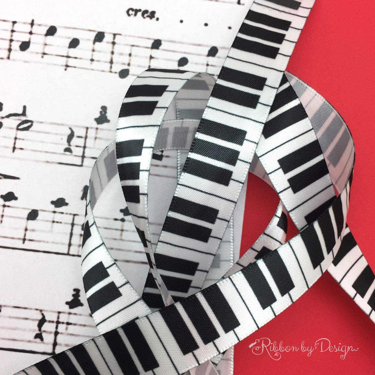 Our fun keyboard ribbon will make any music lover sing when this ribbon is on a gift or favor!