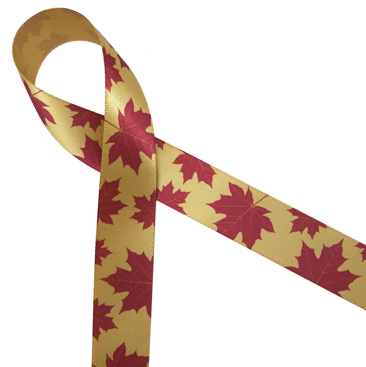 Maple leaves in red on 7/8" dijon gold single face satin ribbon is the ideal expression of Autumn!
