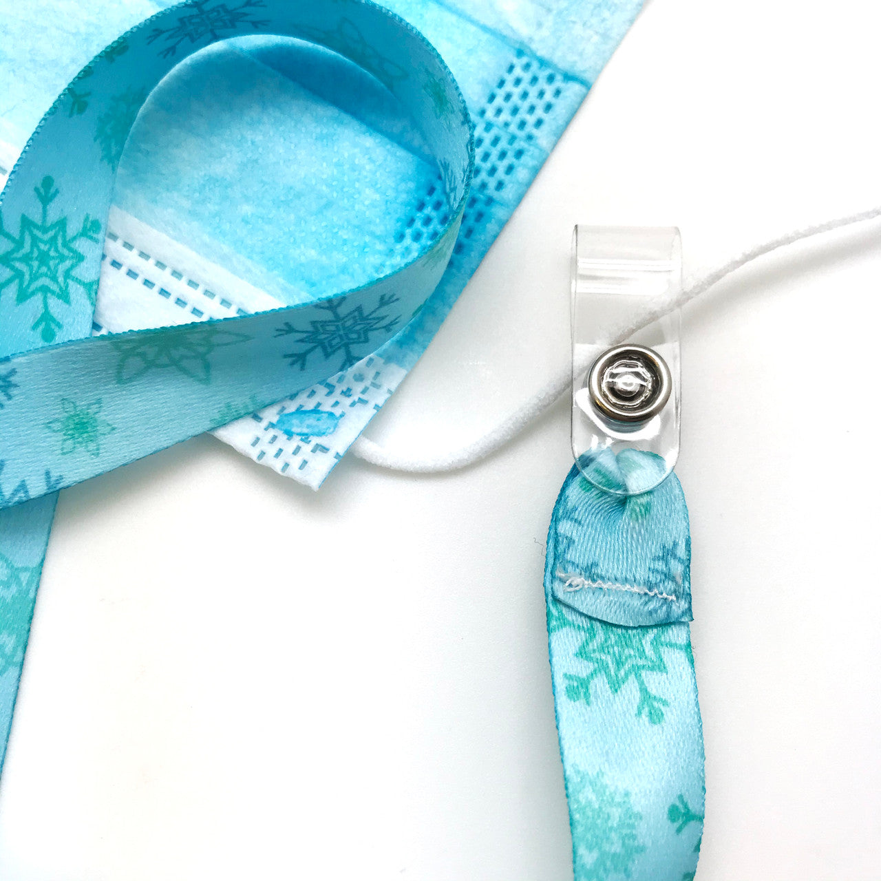 Frozen theme snowflakes Face mask holder lanyard 24" long  with vinyl  snap fittings printed on 5/8" Ultra Lanyard fabric