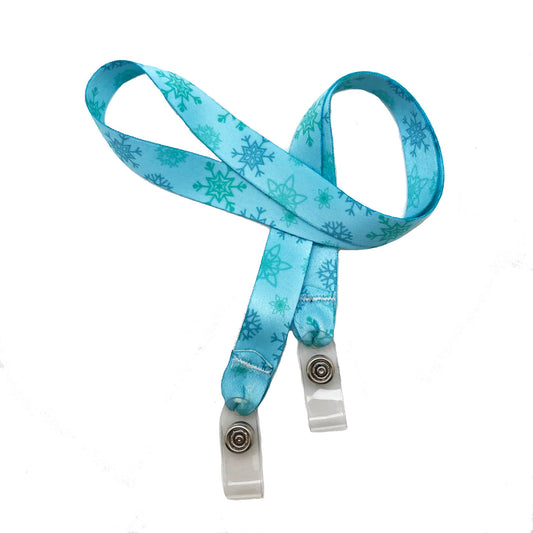 24" mask holder with soft plastic snap closures printed with our blue snowflake design printed on both sides on  5/8" Ultra Lanyard material are perfect for children and adults for keeping track of face masks at school, sports practice, lunch and break time.
