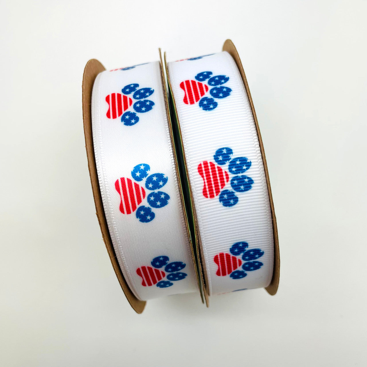 Our patriotic paw prints are offered in satin and grosgrain for all your crafting needs!
