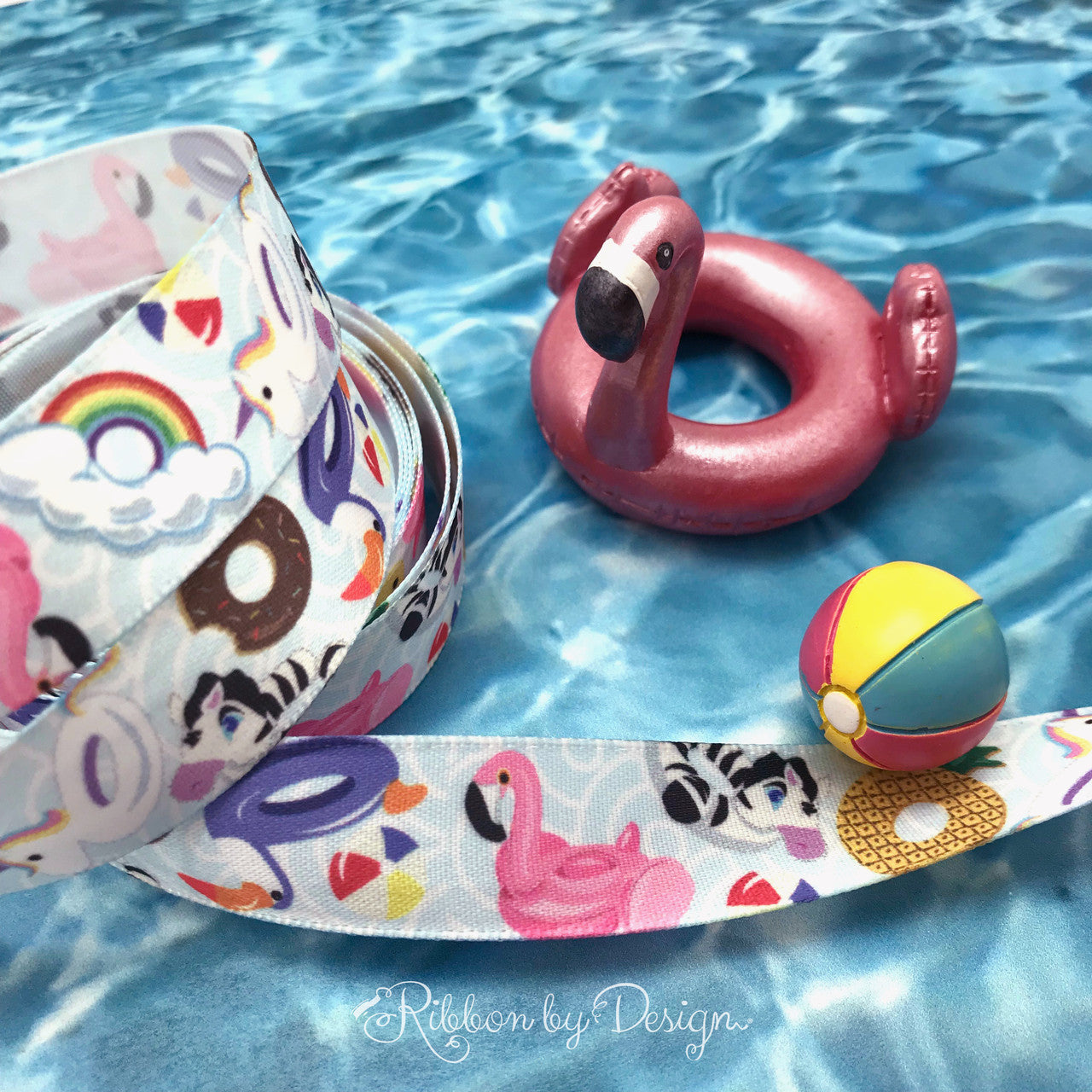Make the favors at your pool party really pop with our pool float ribbon! Our ribbon is 5/8" wide printed on white single face satin.
