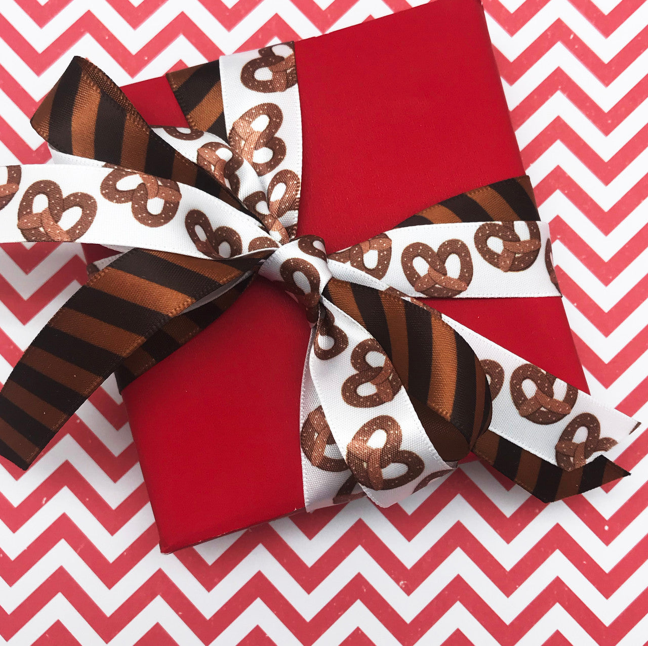 Who doesn't like sweet and salty? Pair our chocolate stripes with pretzels for fun party favors!