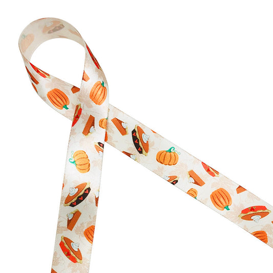Pumpkin pie ribbon with pies and pie slices tossed on a beautiful tone on tone leaf pattern printed on 7/8" antique white single face satin is the ideal ribbon for Fall events, parties, Thanksgiving celebrations and decor. Be sure to have this ribbon available for gift wrap too! Our ribbon is designed and printed in the USA