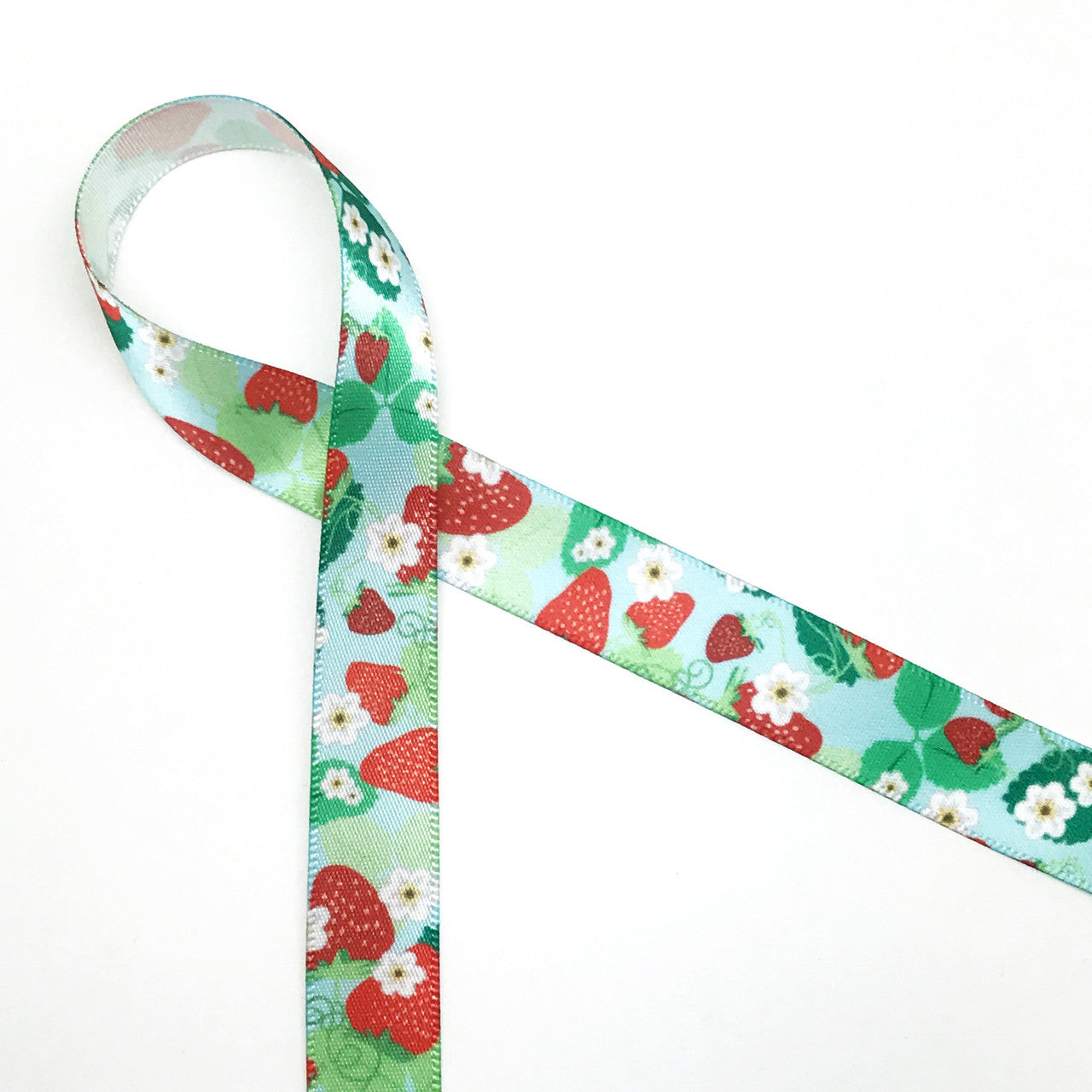 Strawberry pattern with a light blue background printed on 5/8" Single Face Satin ribbon on 10 yard spools