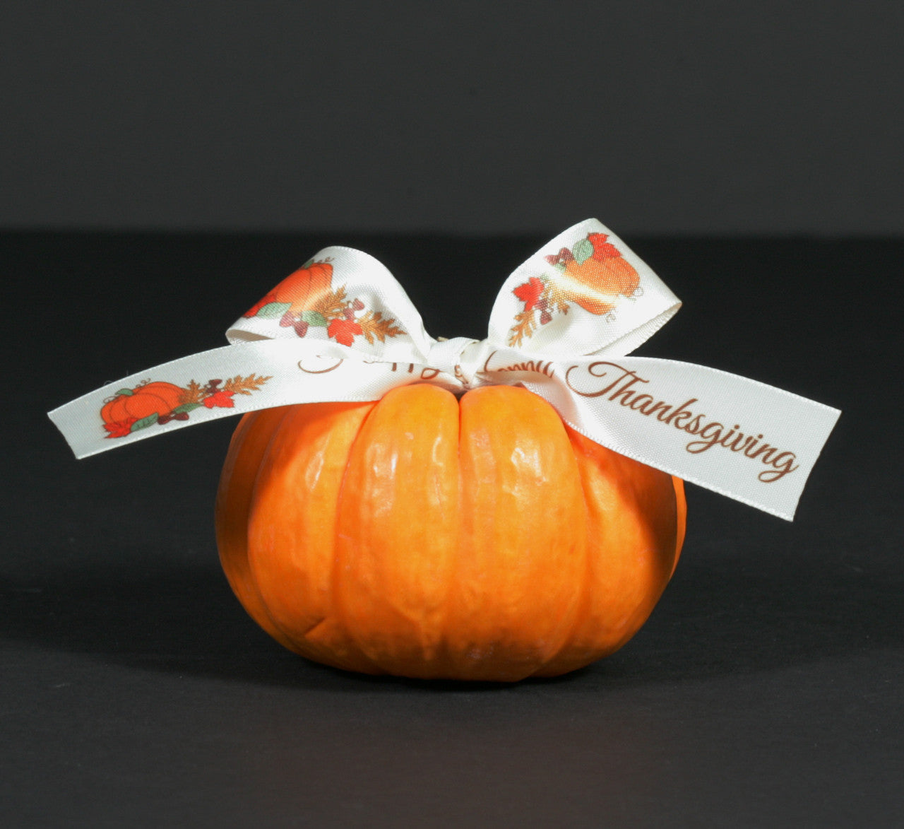 Add our Happy Thanksgiving ribbon to a mini pumpkin and add it to your table for a wonderful Fall tablescape.