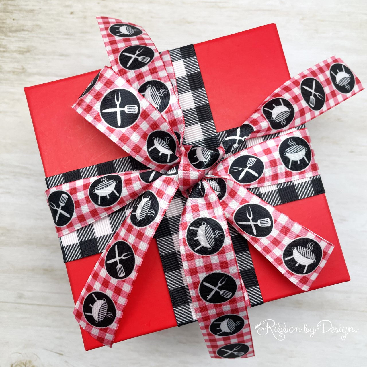 Mix and match our barbecue grill ribbon with black and white gingham for a fun gift wrap look!