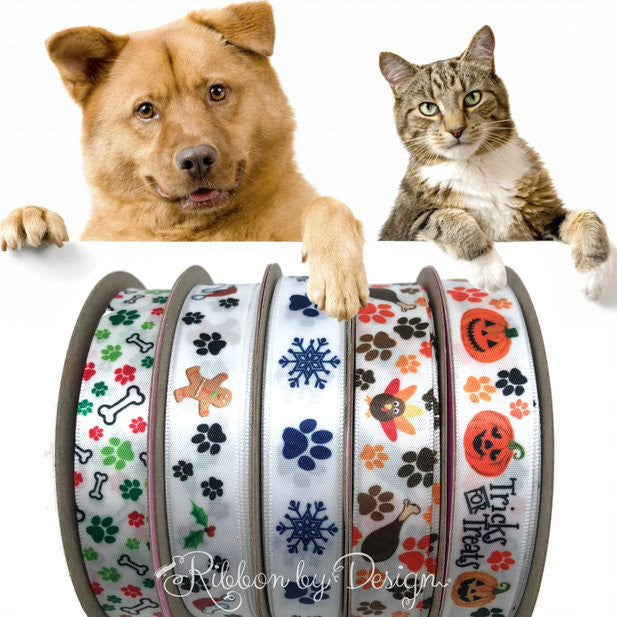 Tricks for Treats ribbon with paw prints and Jack O' Lanterns for pets printed  on 5/8" white single face satin