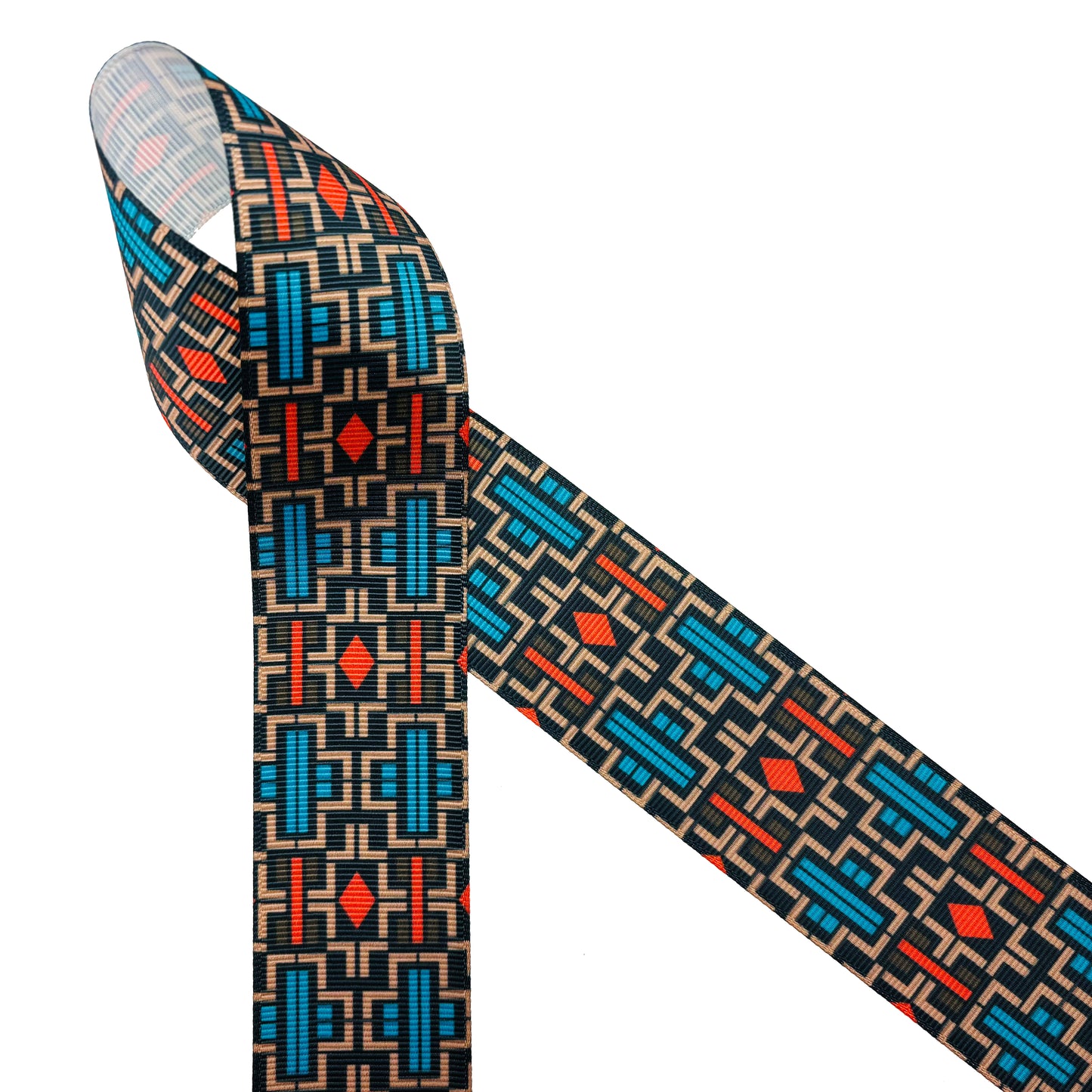 Aztec Design ribbon printed in three color ways of orange, black and cream printed on 1.5" white grosgrain