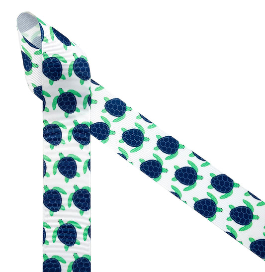 Turtles in blue and green printed on 1.5" white grosgrain ribbon make the perfect preppy bows! This fun prepster ribbon is ideal for hat bands, head bands, hair bows, gift wrap and sewing projects. Be sure to have this ribbon on hand for all those Summer preppy projects! Our ribbon is designed and printed in the USA