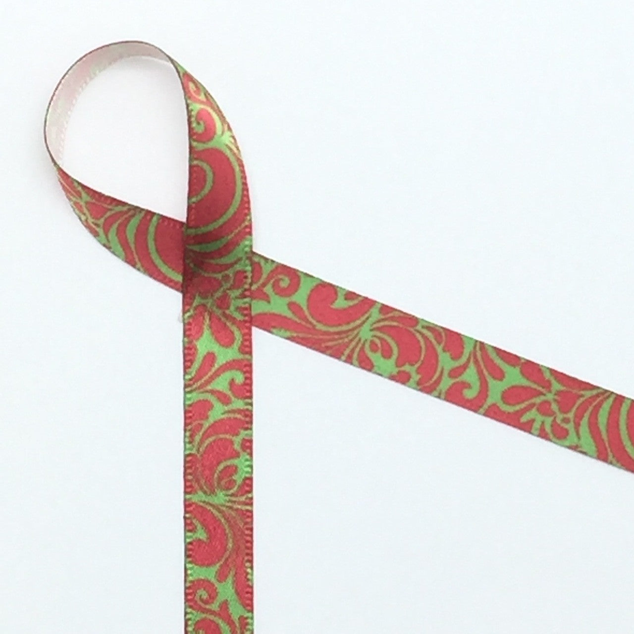 Christmas Swirls Ribbon, red and green on 3/8" white single face satin