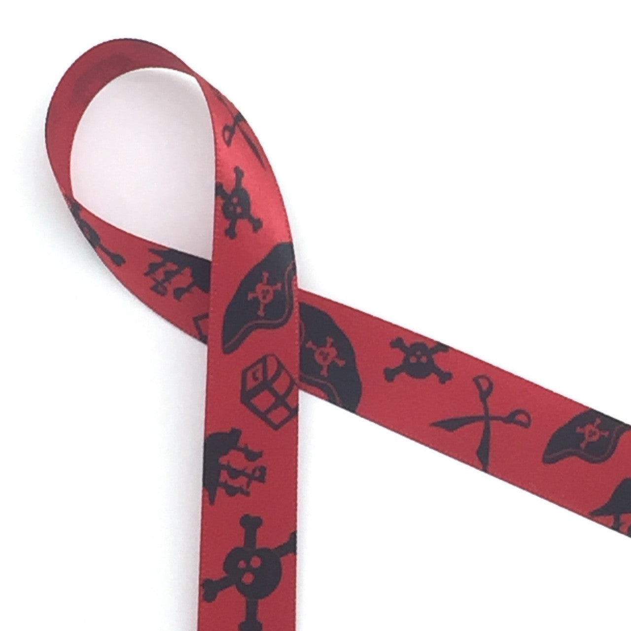 Pirate Ribbon silhouettes in black on 5/8" red single face satin ribbon