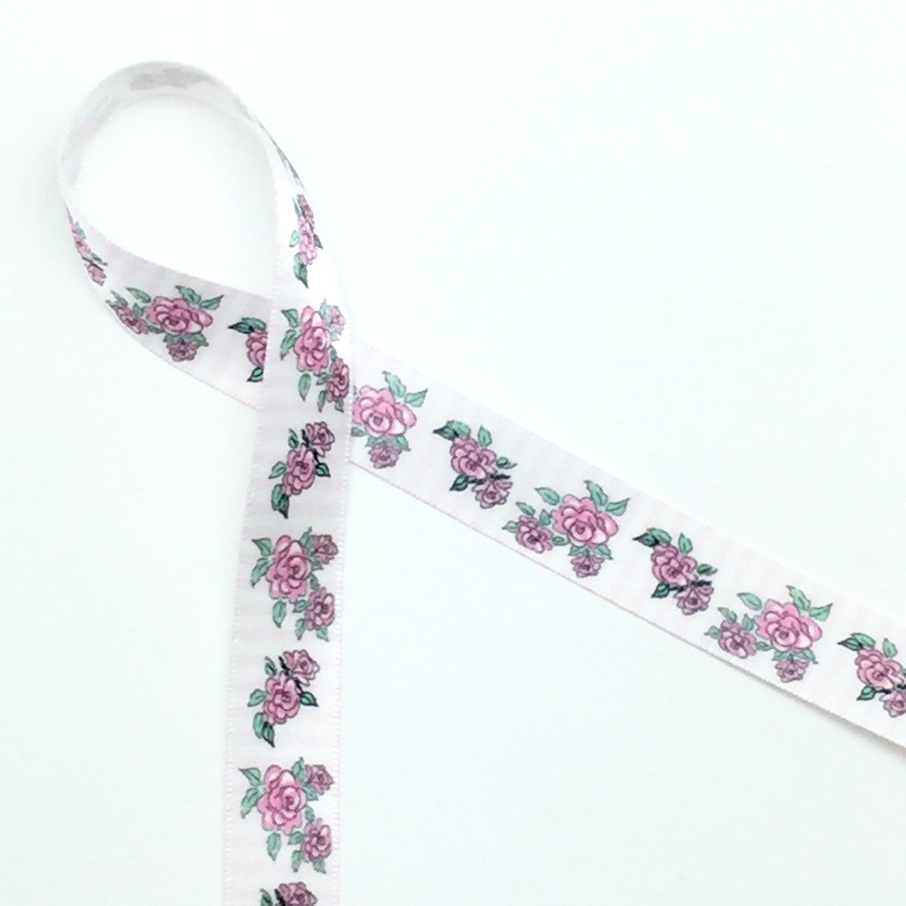 Pink Roses on a faint stripped background on 5/8