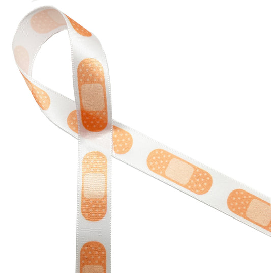 Band aids ribbon printed on 5/8" white single face satin