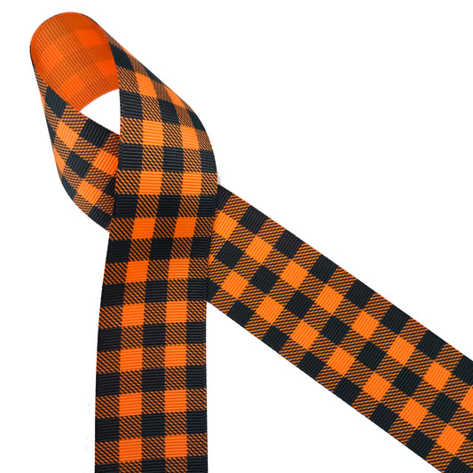 Black plaid ribbon printed on 1.5  tangerine grosgrain