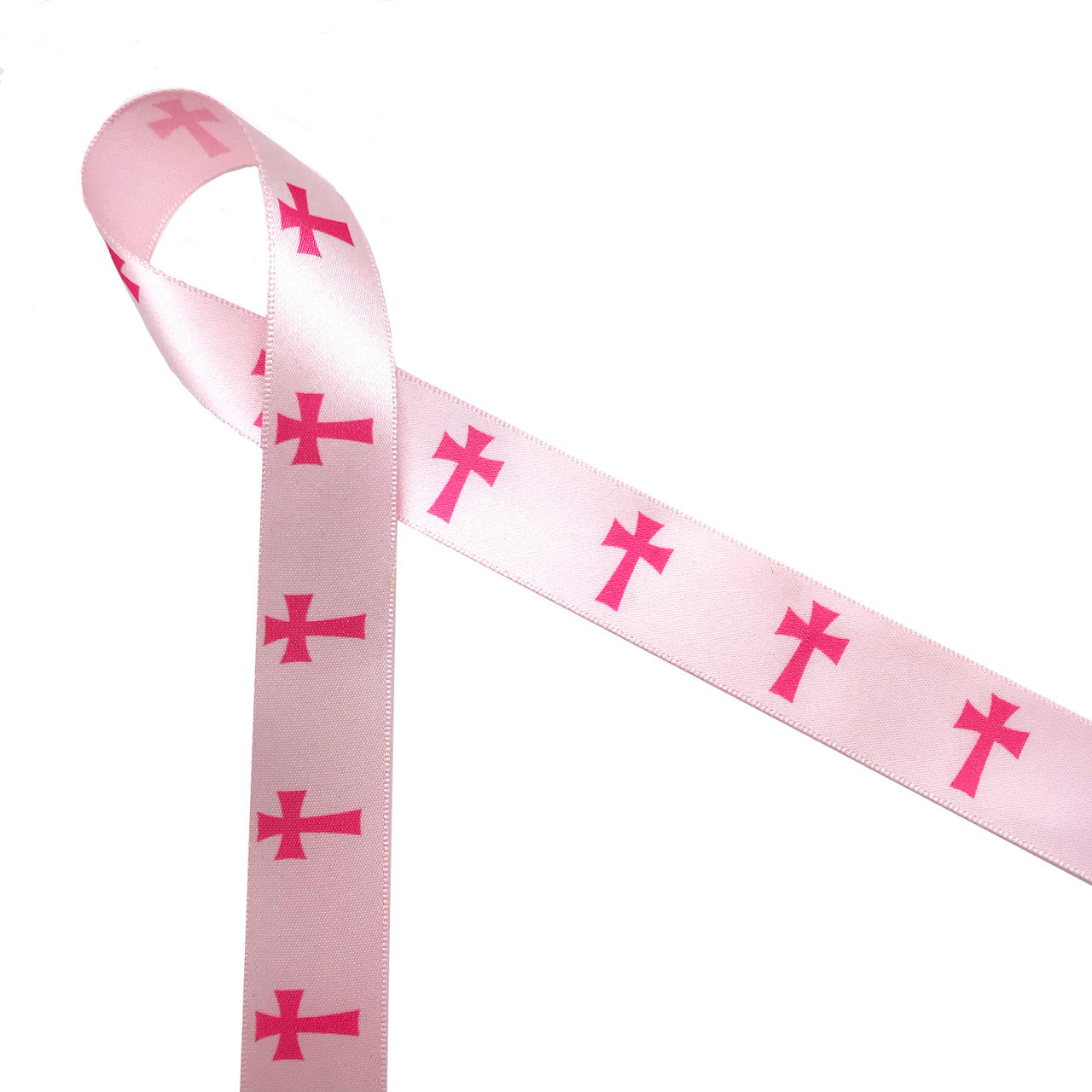 Pink crosses ribbon printed on  7/8" light pink single face satin