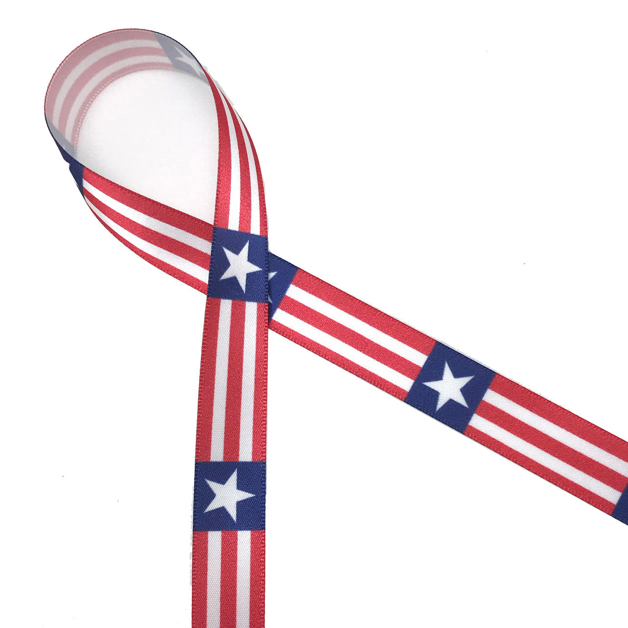 Red and white stripe with star ribbon printed on 5/8" white single face satin ribbon