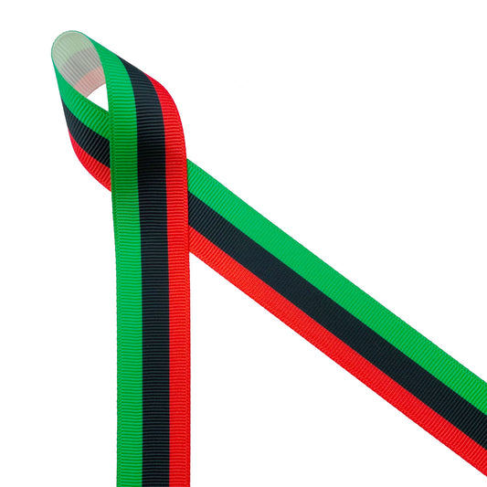 Pan-African flag ribbon in stripes of green, black and red printed on 7/8" white grosgrain ribbon is the ideal ribbon for African themed celebrations. Use this ribbon for Juneteenth celebrations, gift wrap, gift baskets,  African themed crafts, sewing,  and quilting projects. This is a great ribbon for hair bows, fascinators and hat making too! All our ribbons are designed and printed in the USA. 