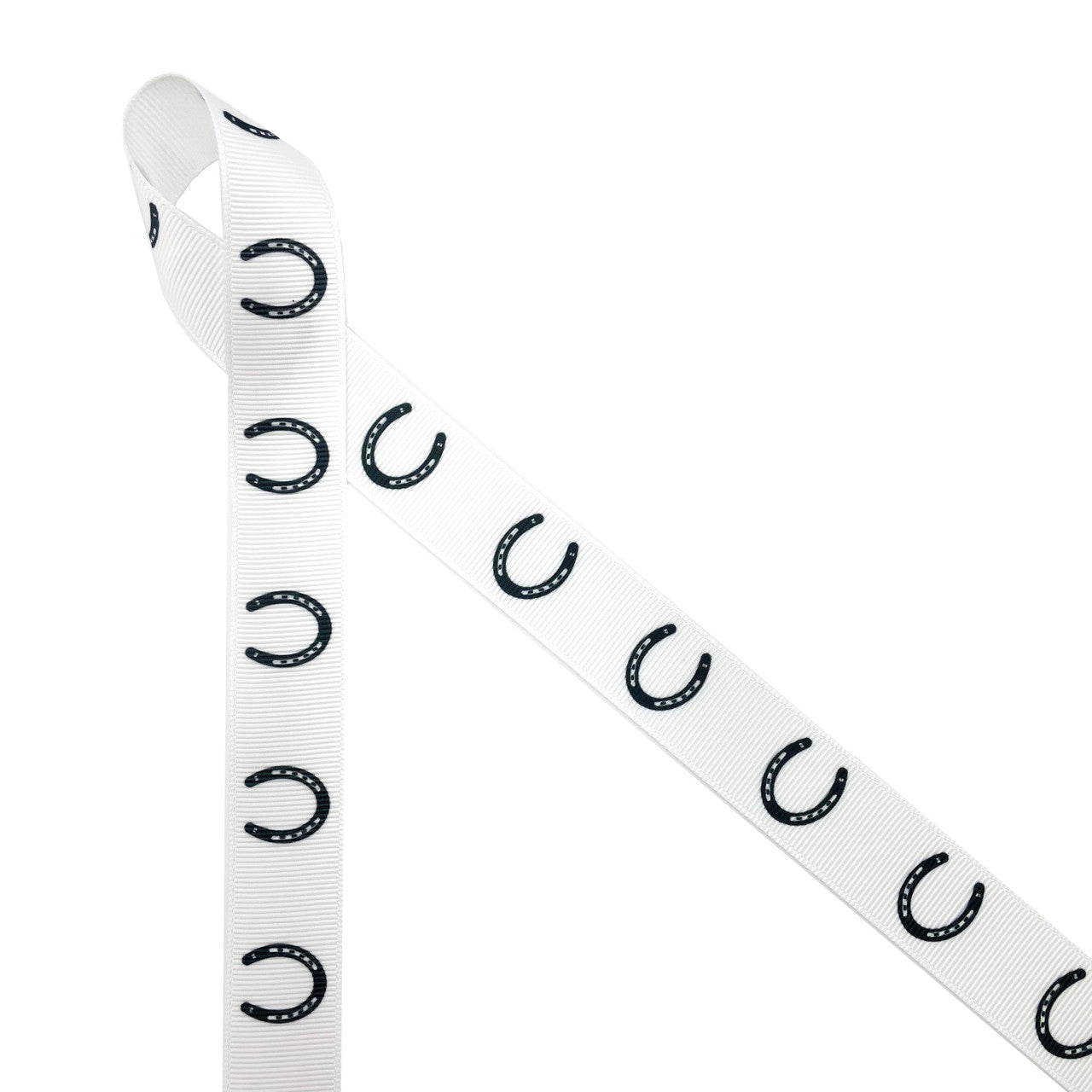Equestrian ribbon horse shoes in a row in black printed on  7/8" white grosgrain,